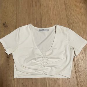 pretty little thing cropped fitted white shirt sleeve shirt in size medium